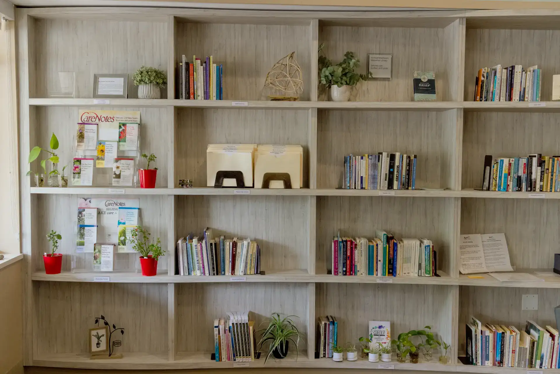 Books for grief support on shelves